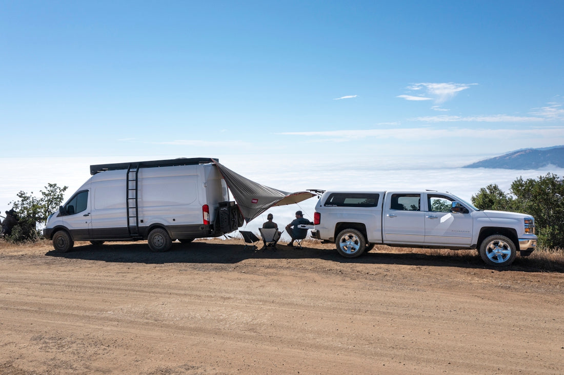 white van on brown sand during daytime