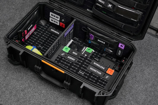 A black case with musical equipment inside